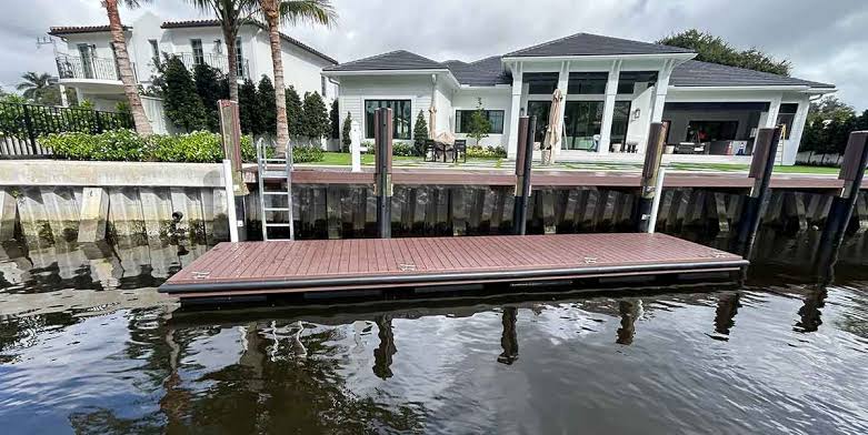 A modern composite floating dock system designed to ride tidal shifts in a canal., AI generated